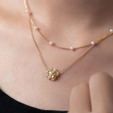 Collana di fiori con perle doppie | Oro