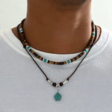 Collana di lusso per uomini con perle in turchese e occhio di tigre | Oro
