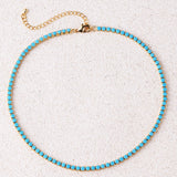 Collana tennis rotonda turchese | Oro