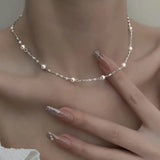 Collana elegante con perle brillanti | Oro