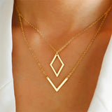 Collana elegante con pendente geometrico a forma di V | Oro