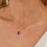 Collana in rubini sovrapposta con Trombone | Oro