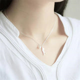 Collana con margherite e un gatto arrampicatore | Oro bianco