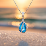Collana a goccia fatta a mano con brillanti blu | Oro