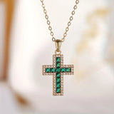 Collana con croce in smeraldo | Oro