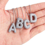 Collana con iniziale in lettere a bolle | Oro bianco