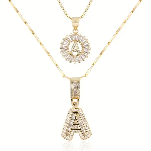 Collana con iniziale in pavé | Oro bianco