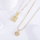 Collana con iniziale in pavé | Oro bianco