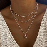 Collana rétro con stella | Oro