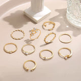 Set di 10 anelli di supporto decorati in oro bianco e oro | Oro bianco
