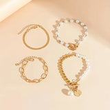 Set di bracciali chic - serpente, perle & maglie | Oro