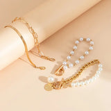 Set di bracciali chic - serpente, perle & maglie | Oro
