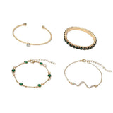 Set di bracciali scintillanti di smeraldo | Oro