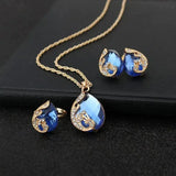 Set di collana e orecchini in cristallo blu con doratura | Oro