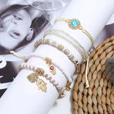 Set di braccialetti hamsa | Oro
